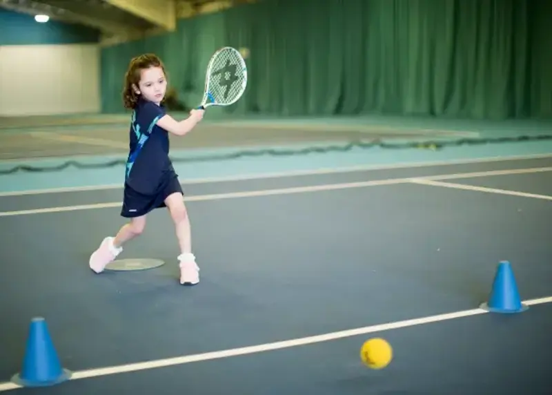 Two Column Girl Playing Tennis