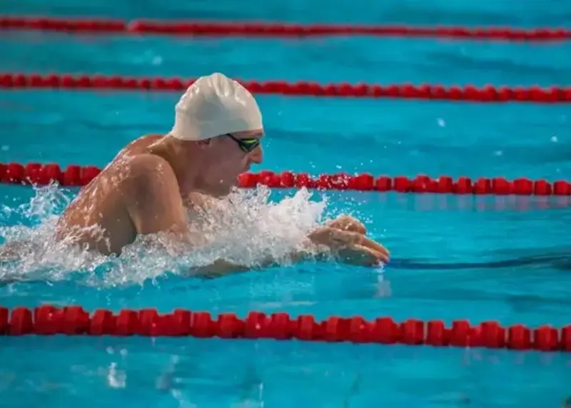 Man swimming breaststroke