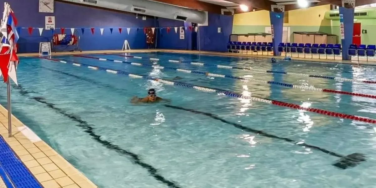 Man swimming lanes in the pool